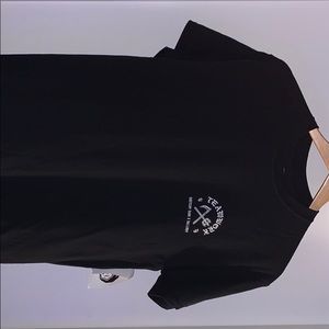 Brand new graphic tee with tags still attached.